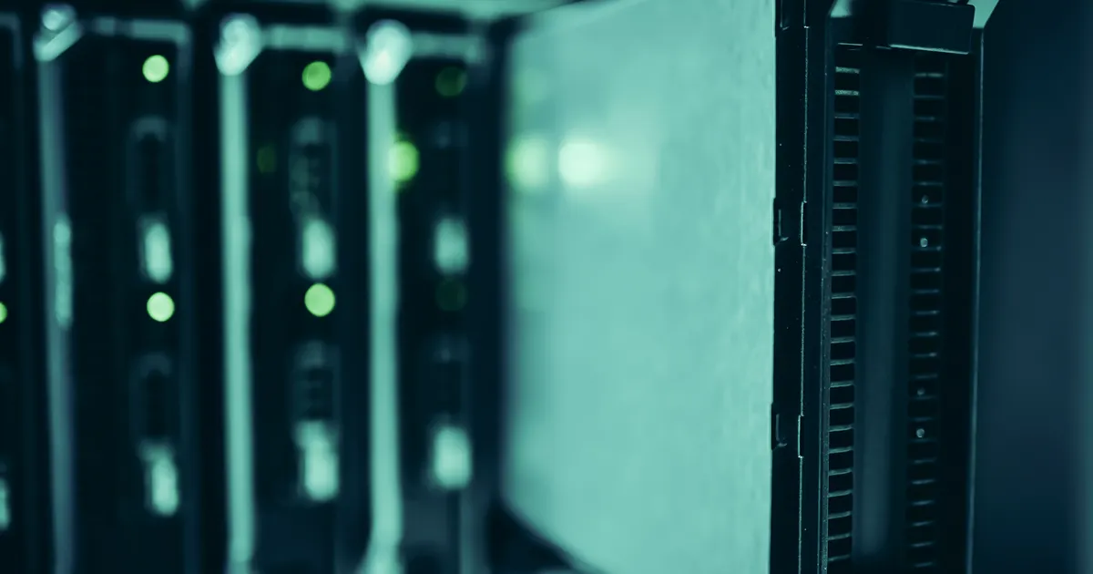 Close-up of server racks in a data center highlighting modern…, illustrating the section “Duplicates, cannibalisation, canonicals and pagination”